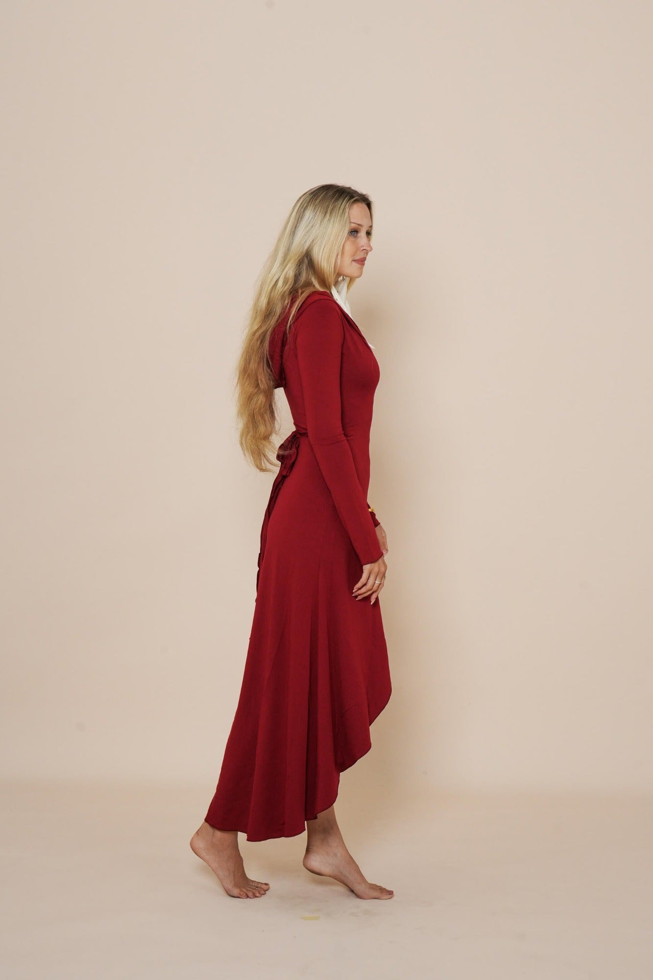 Beautiful long wrap around dress with hood in color scarlet red.