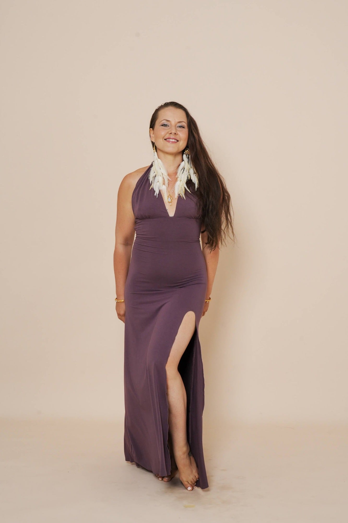 Beautiful long halter dress, with a side cut in eggplant.