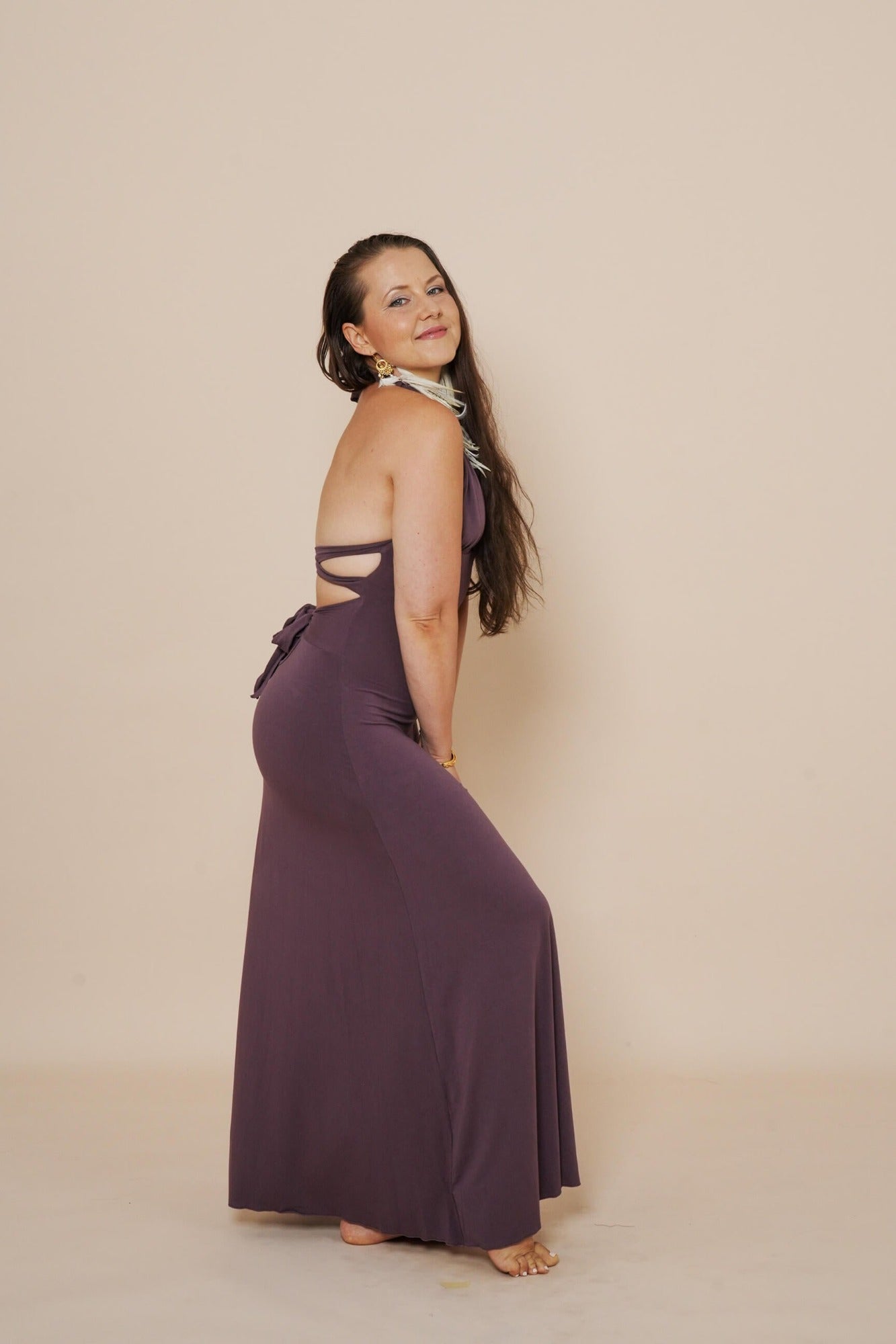 Beautiful long halter dress, with a side cut in eggplant.