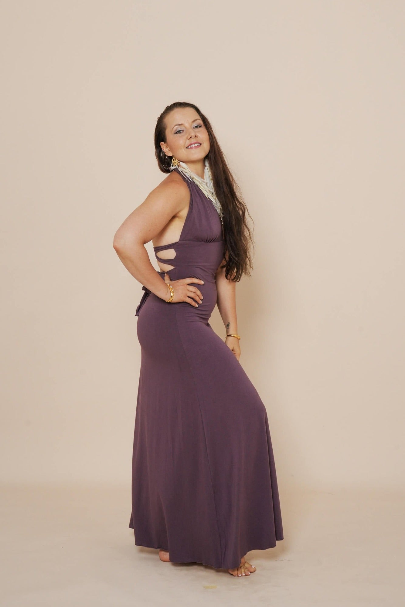 Beautiful long halter dress, with a side cut in eggplant.