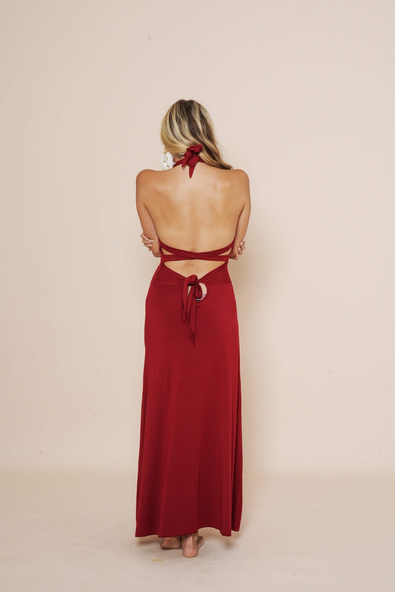 Beautiful long halter dress, with a side cut in scarlet.