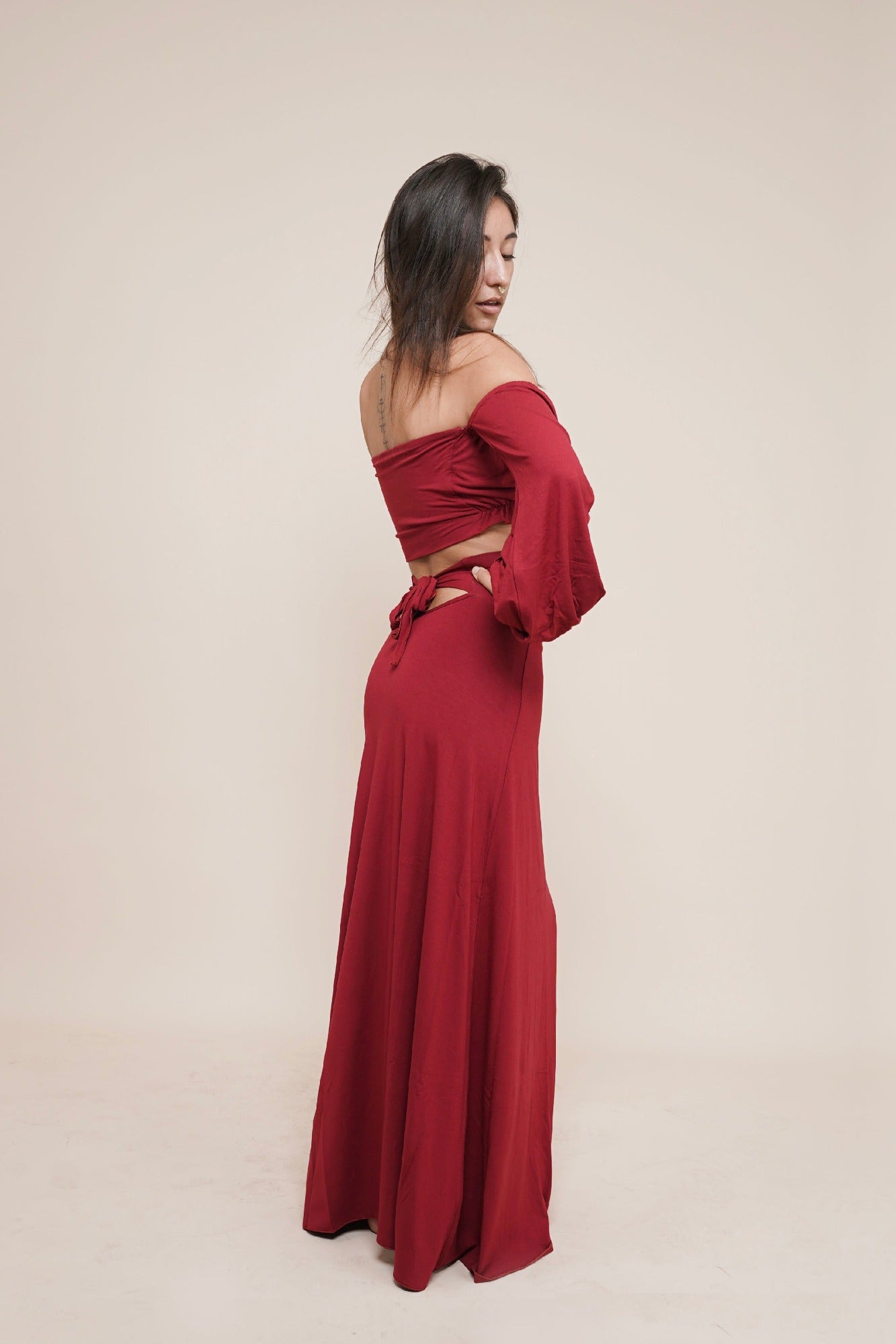 Beautiful skirt with bow in the back and adjustable waist line paired with Liberate off shoulder puffy sleeve top by Bohemian Goddess I Color: Scarlett I www.bohemiangoddess.com