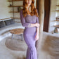 Hip long shirt with 3/4 sleeve length, medieval neck shape, lace details on sleeves and bust in color eggplant.