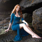 Lace crop top with mermaid lace skirt, combined with black feather earrings.