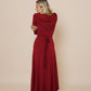 Beautiful long wrap around dress with hood in color scarlet red.