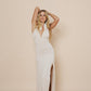 Beautiful long halter dress, with a side cut in color winter white.
