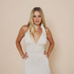 Beautiful long halter dress, with a side cut in color winter white.