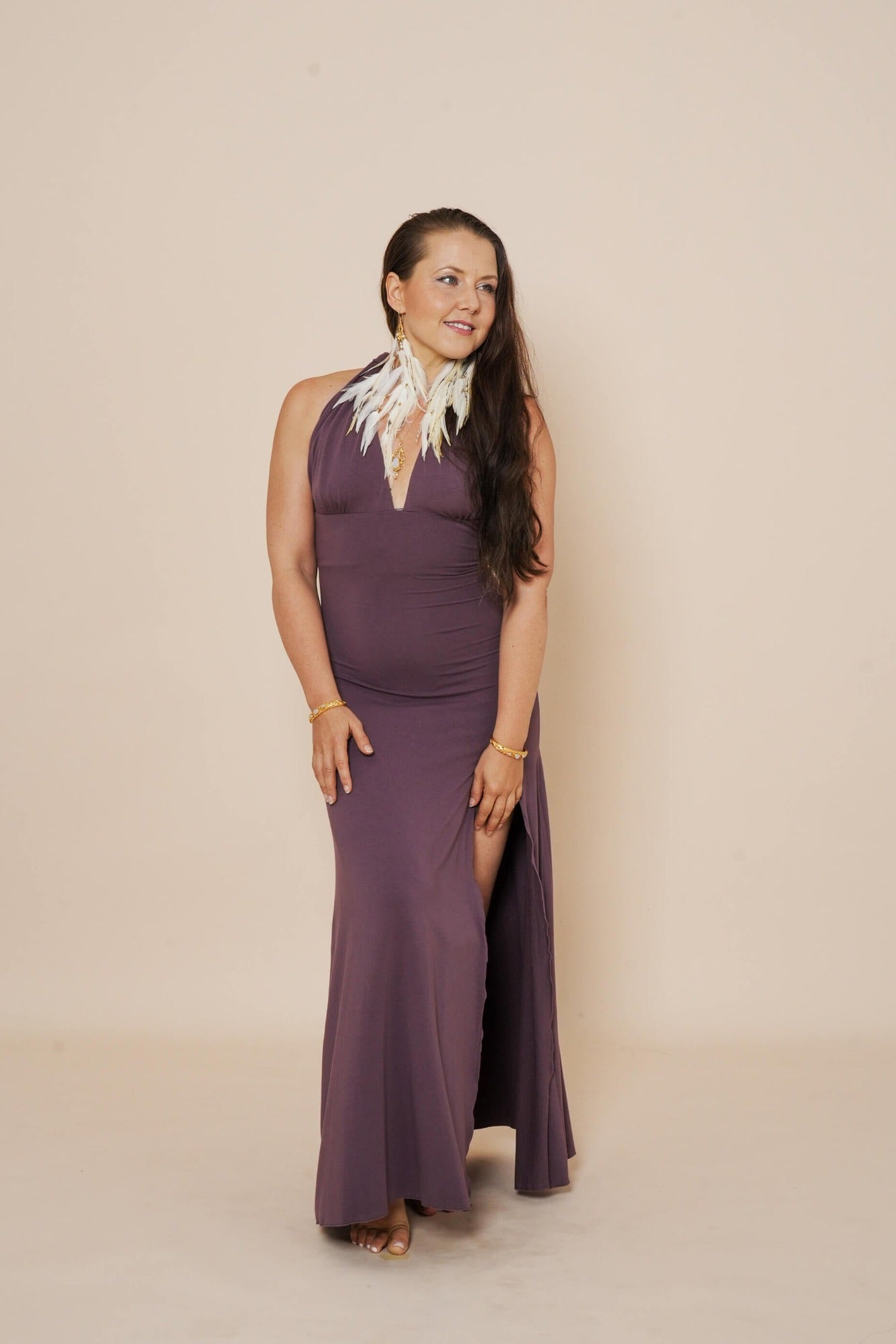 Beautiful long halter dress, with a side cut in eggplant.
