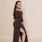 Off shoulder long dress with side cuts and 3/4 sleeves in color chocolate.