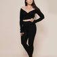 Charm off-shoulder wrap shirt black styled with leggings