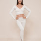 Charm off-shoulder wrap shirt winter white styled with leggings 2