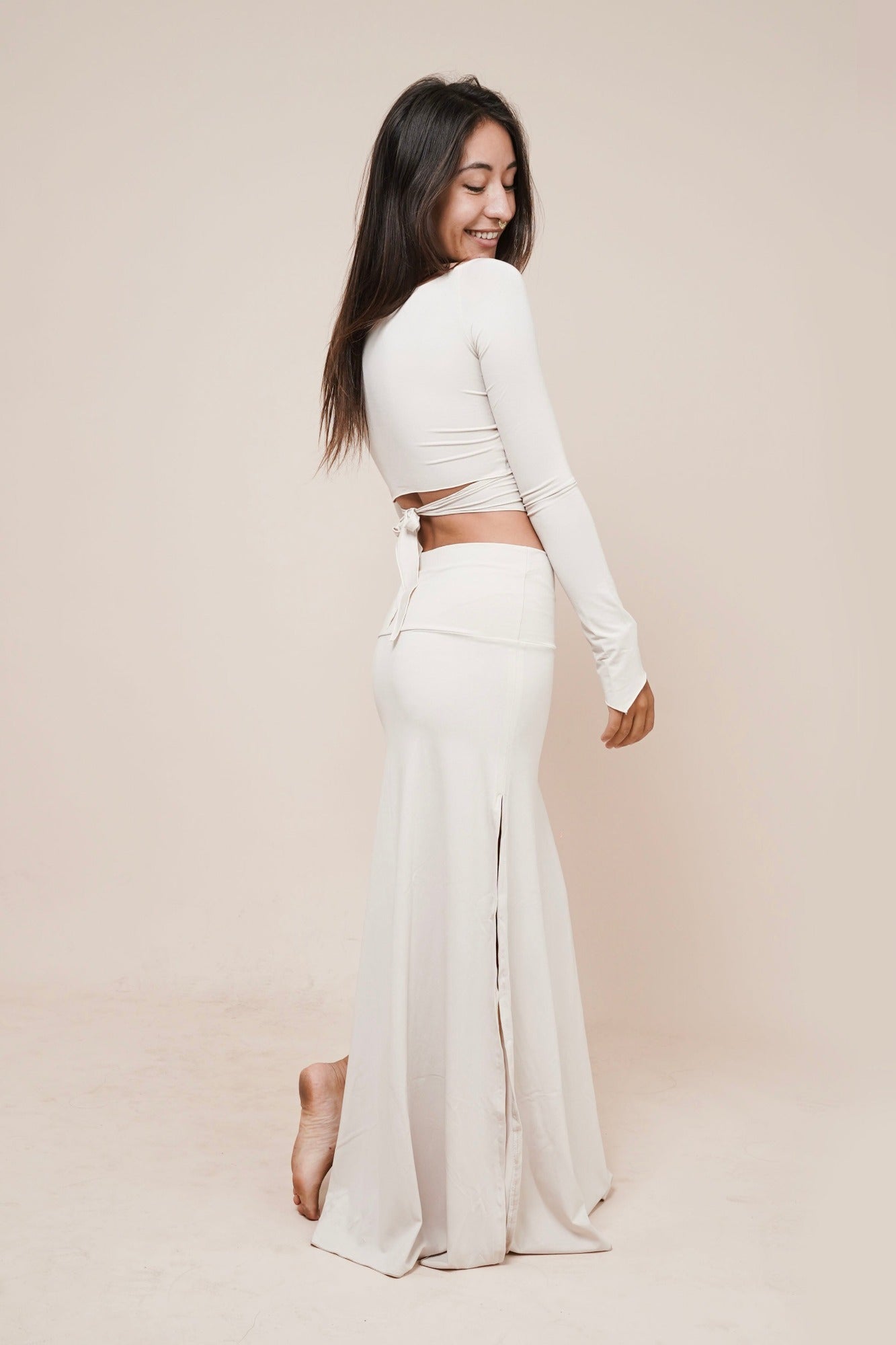 Charm off-shoulder wrap shirt styled with Harmony skirt in winter white side view