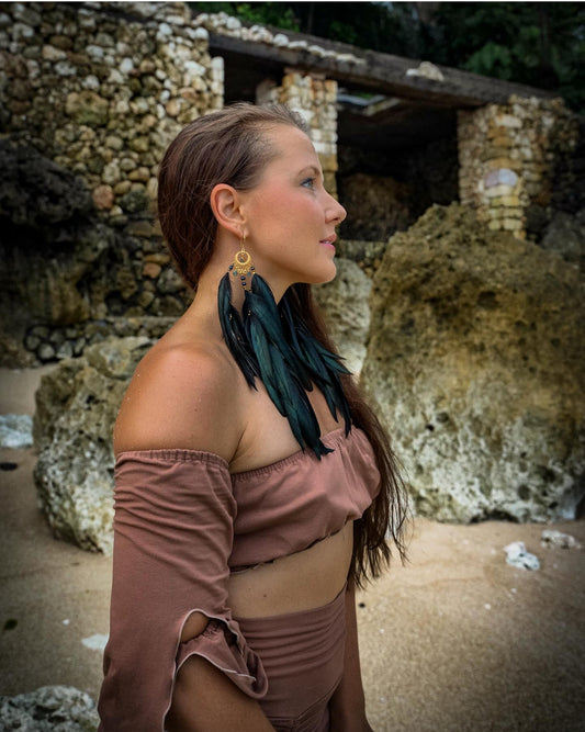 Isis labradorite feather earrings with gold moon charm — goddess jewelry for healing and protection.