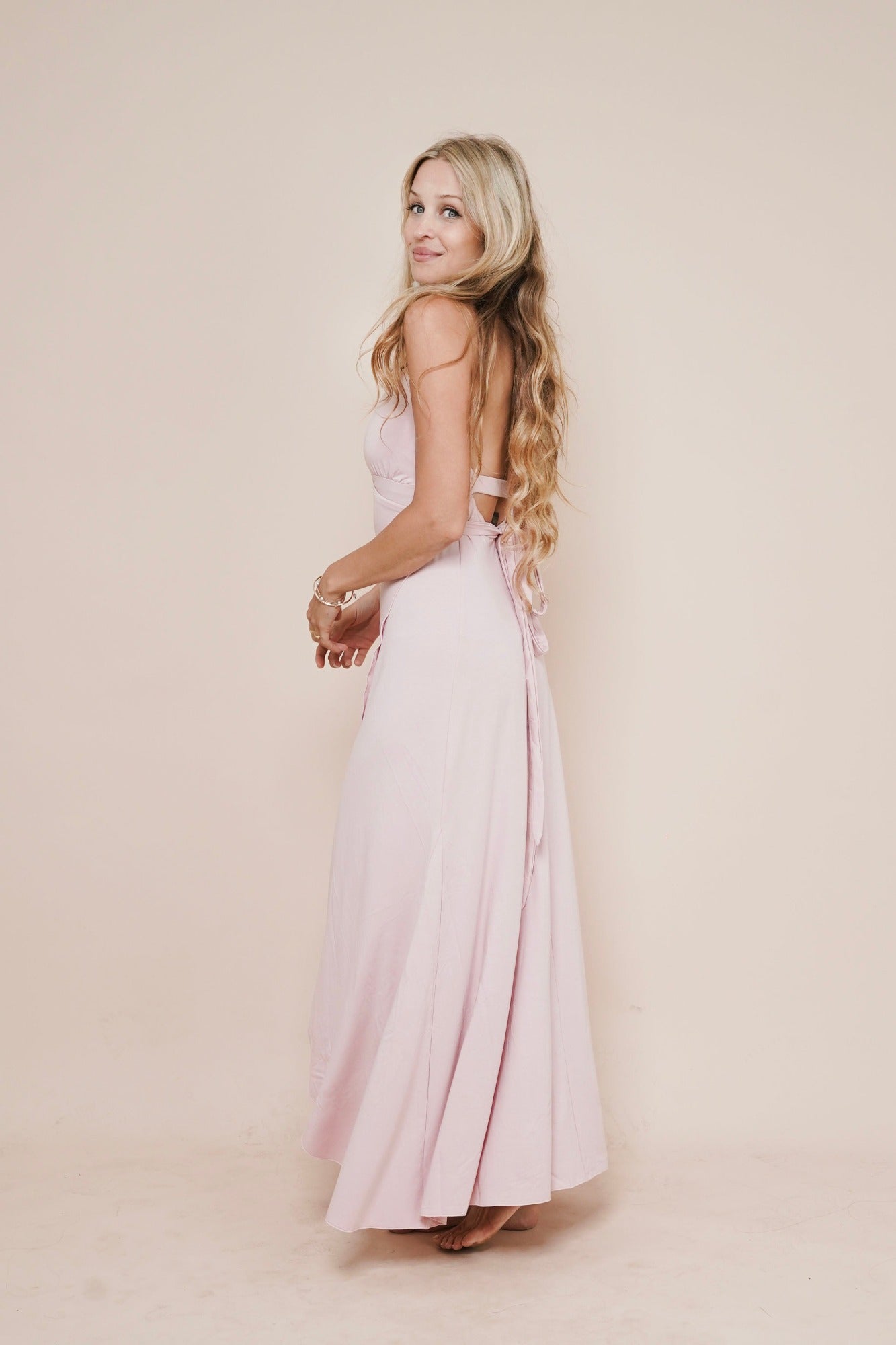 Super cute pink long maxi wrap around dress by Bohemian Goddess I Color: Pink Rose I www.bohemiangoddess.com