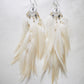Bohemian Goddess crystal earrings named My Feminine Essence with Rainbow Moonstones and white feathers 