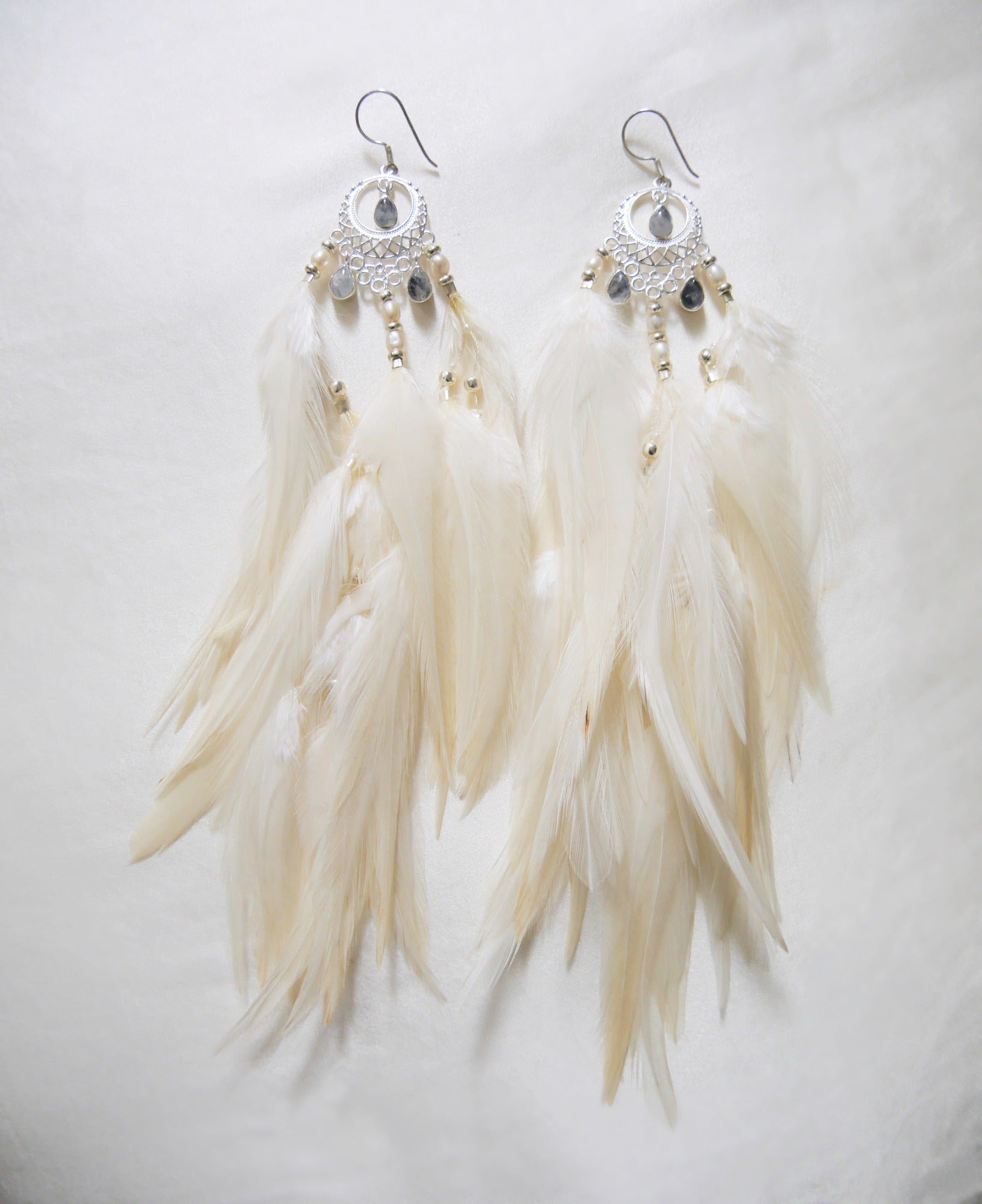 Bohemian Goddess crystal earrings named My Feminine Essence with Rainbow Moonstones and white feathers 