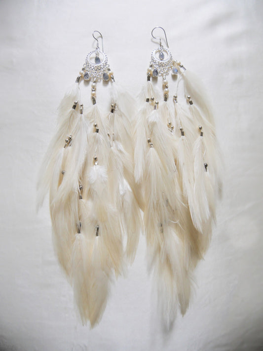 Bohemian Goddess crystal earrings named My Feminine Essence with Rainbow Moonstones and white feathers 