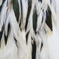 Bohemian Goddess long feather earrings with white and emerald green feathers, green quartz crystals.