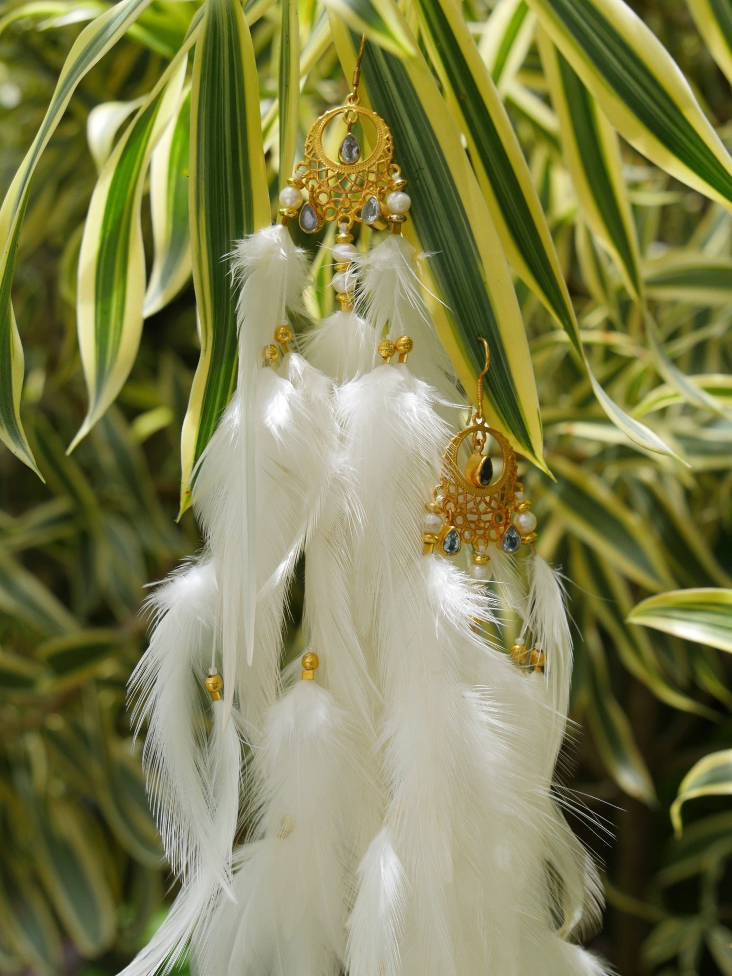 Bohemian Goddess long white feather earrings named My truth sets me free with Blue Topaz crystals