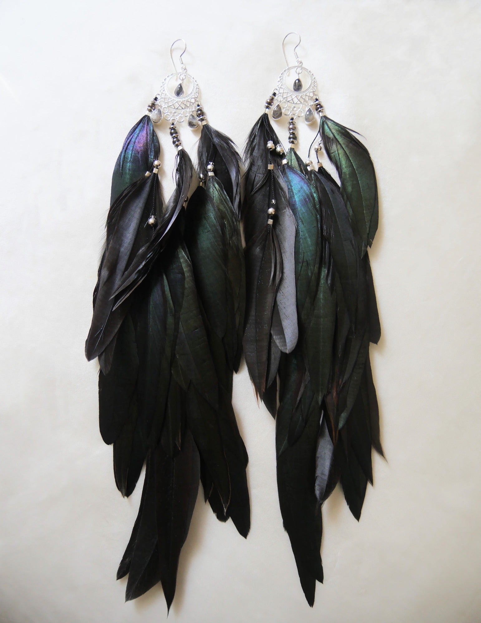 Long black-green emerald feather earrings with labradorite stones and silver accents