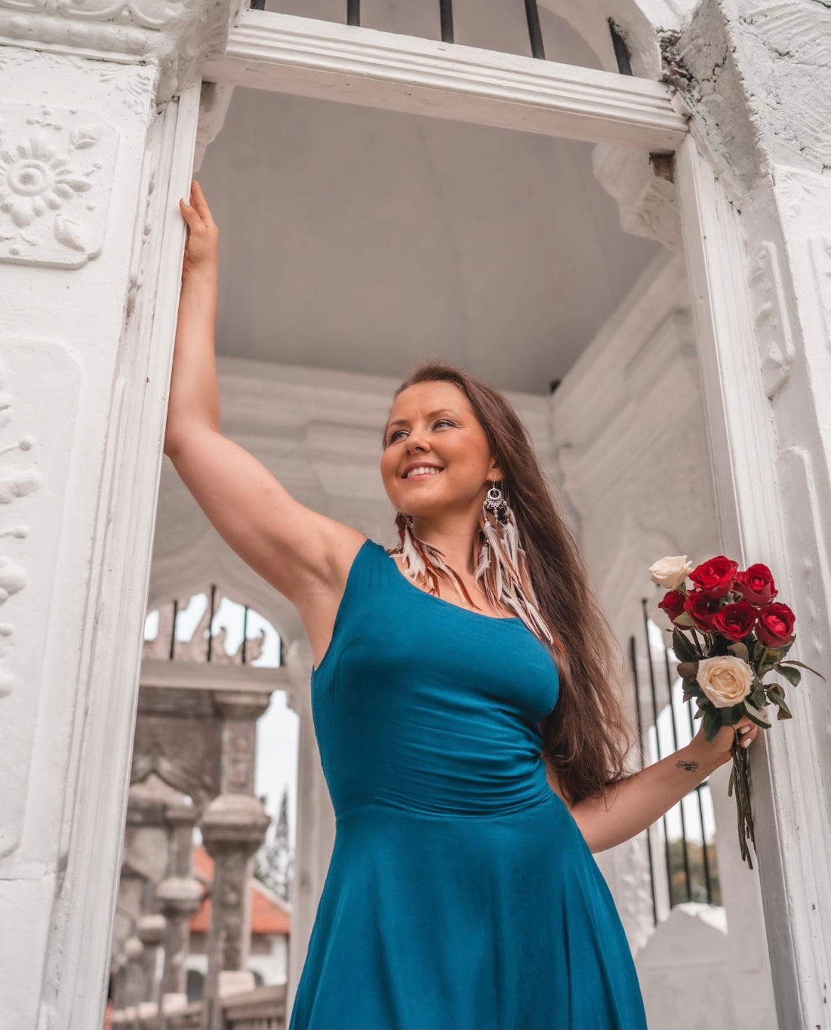 Brown and white feather earrings with smoky quartz stones — Demeter goddess jewelry on woman withbrown hair
